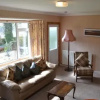 Отель Clint Lodge Cottage, фото 1