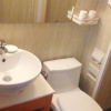 Отель Izunco Inn Qingdao TV Mansion, фото 10