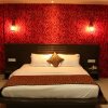 Отель OYO Premium Teen Batti Devka Road, фото 5