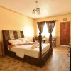 Отель Inn and Suites at Roz and Angeliques, фото 2