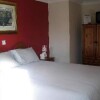 Отель Axe & Compass Lodge, фото 4