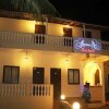 Отель Amoura Beach Resort в Бага