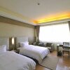 Отель Dalian Xinghaijiaxin Apartment, фото 13