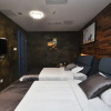 Отель Qingmu Hotel (Nanjing Jiangdongbei Road Provincial Maternity and Child Health Care Hospital Shop), фото 3