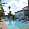Отель Beach Club 10 Bedrooms 8.5 Bathrooms Home, фото 17