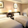 Отель Yiwu Orange Hotel, фото 6