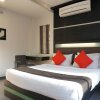 Отель Capital O 28762 Skylark Business Hotel в Колхапуре