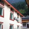 Отель Zhuo Ma Youth Hostel, фото 1