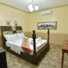 Отель Inn and Suites at Roz and Angeliques, фото 3