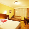 Отель Izunco Inn Qingdao TV Mansion, фото 6