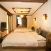 Отель Tian Long Inn - Lijiang, фото 23