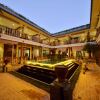 Отель Lichengbieyuan No.9 Courtyard (Lijiang Ancient City Snow Mountain View Shop), фото 1