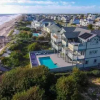 Отель Ocean Commotion - 7 Br Home, фото 11