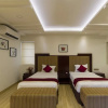 Отель OYO Premium Indiranagar Cambridge Layout, фото 3