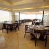 Отель OYO Premium Thaltej Cross Road SG Highway, фото 5