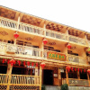 Отель Longji Da Yao Zhai International Youth Hostel, фото 1