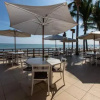 Отель Casa de Playa Bungalows & Restaurant, фото 1