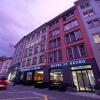 Отель Boutique Hotel St. Georg Ferienwohnung в Айнзидельне