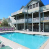 Отель Ocean Commotion - 7 Br Home, фото 6