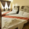 Отель Inn and Suites at Roz and Angeliques, фото 4