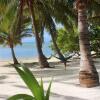 Отель Paparei Beachfront Bungalows, Aitutaki, фото 4