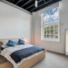 Отель London Woolstores Warehouse Apartment, фото 1