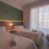 Отель Vizion Suites, фото 2