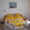 Отель Arany Apartmanház, фото 6