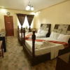 Отель Inn and Suites at Roz and Angeliques, фото 8