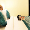 Отель OYO Premium DLF City Club, фото 6