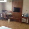 Отель Izunco Inn Qingdao TV Mansion, фото 5
