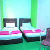 Отель SPOT ON 90123 Rainbow Guest House, фото 13