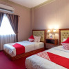 Отель Super OYO Capital O 293 Mutiara Hijau Suites Syariah, фото 14