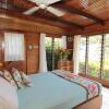 Отель Coconut Grove Beachfront Cottages, фото 6