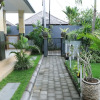 Отель Canggu Nadi Guesthouse, фото 17