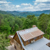 Отель Hand Hewn Hideaway Stunning Gatlinburg Cabin with Hot Tub Table Games and Outdoor Oasis, фото 17