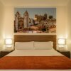 Отель Apartamentos H2 Cáceres, фото 6