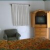 Отель Orchard Garden Hotel & Suites, фото 2