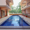Отель OYO 10973 Home Exotic 2BHK Pool View Siolim, фото 8