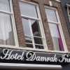 Отель Damrak Inn в Амстердаме
