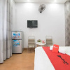Отель RedDoorz Plus @ Huynh Tan Phat, фото 12
