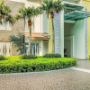 Отель Homey And Big Studio Apartment At The Wave Kuningan, фото 1