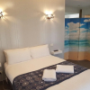 Отель Tropicana Motor Inn, фото 3
