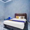 Отель OYO Life 3005 Kost Rumaisha Syariah, фото 16