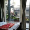Отель Dali Shuanglang Macchiato Sea View Inn, фото 26