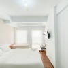 Отель Cozy Stay Studio At Patraland Urbano Apartment, фото 12