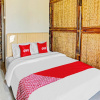 Отель OYO 90225 Rumah Bambu Trawas syariah, фото 19