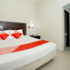 Отель OYO 1005 Hotel Kumala, фото 6