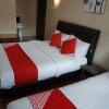 Отель OYO 475 Hotel Seri Pauh в Буките-Мертаджаме