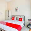 Отель OYO 3434 Penginapan Keluarga Syariah, фото 4